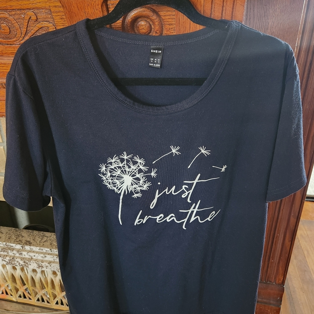 Black Graphic Tee with Dandelion Design